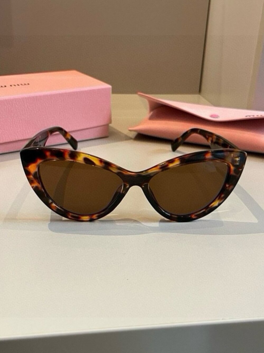 Miu Miu classic tortoise shell frame sunglasses